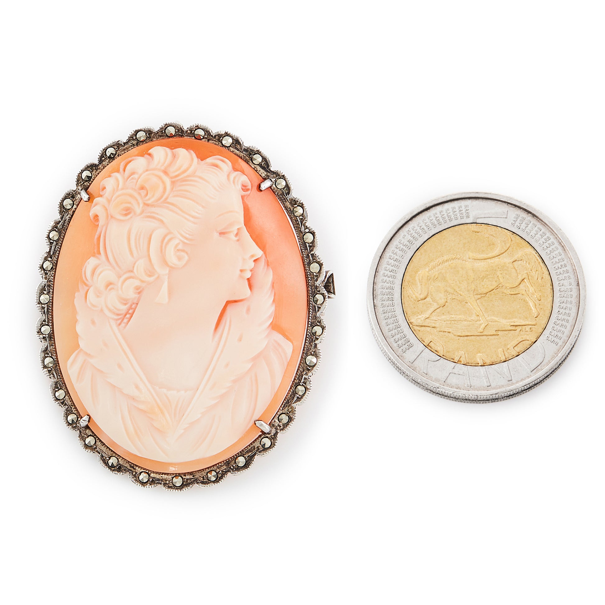 Beautifully carved classic cameo set in a marcasite frame. Can also be worn as a brooch. Circa 1940s