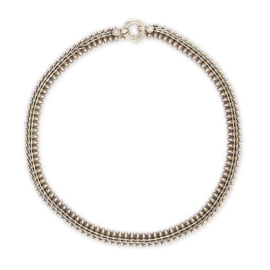 Stylish silver choker necklace with ornate detail and a large bolt ring clasp.