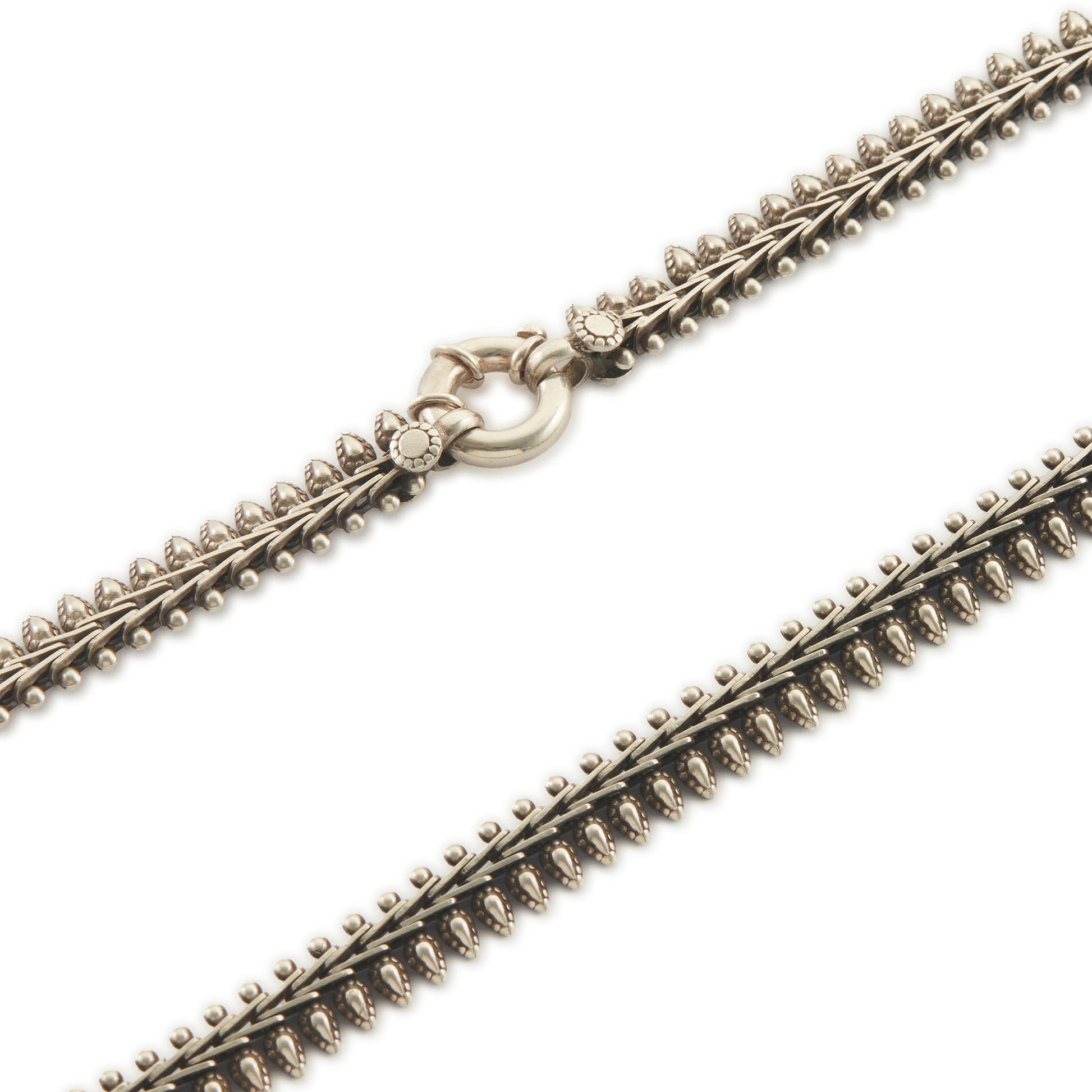 Stylish silver choker necklace with ornate detail and a large bolt ring clasp.