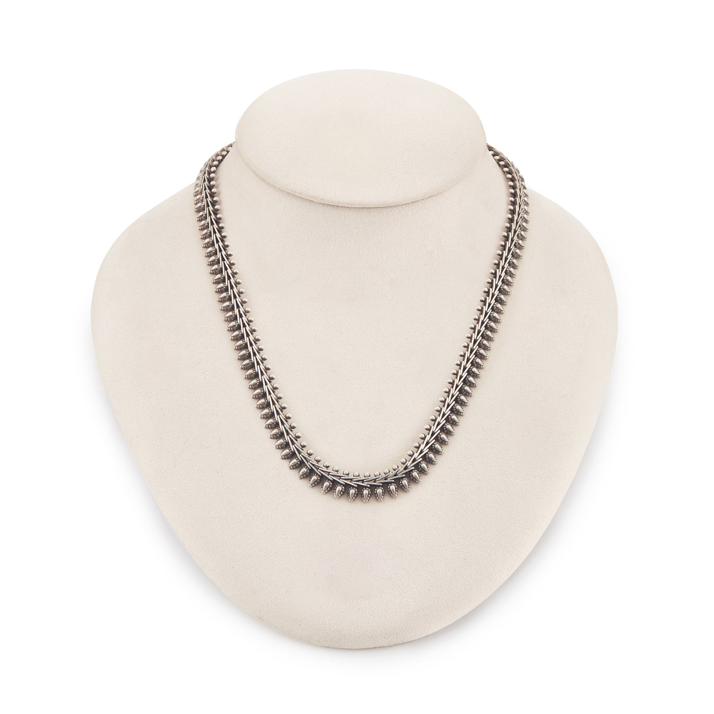 Stylish silver choker necklace with ornate detail and a large bolt ring clasp.