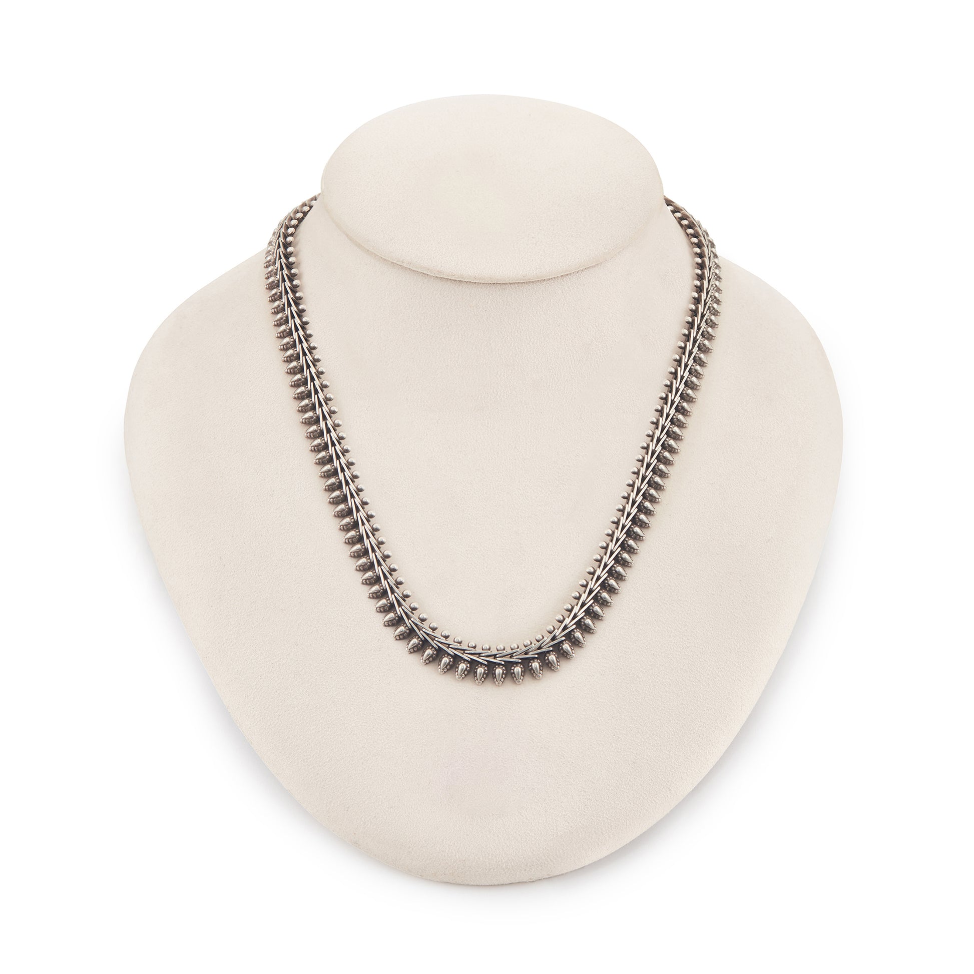 Stylish silver choker necklace with ornate detail and a large bolt ring clasp.