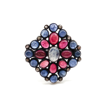 Gorgeous vintage oxidised sterling silver ring set with cabochon sapphires, rubies, a centre moonstone and tiny old-cut diamonds.