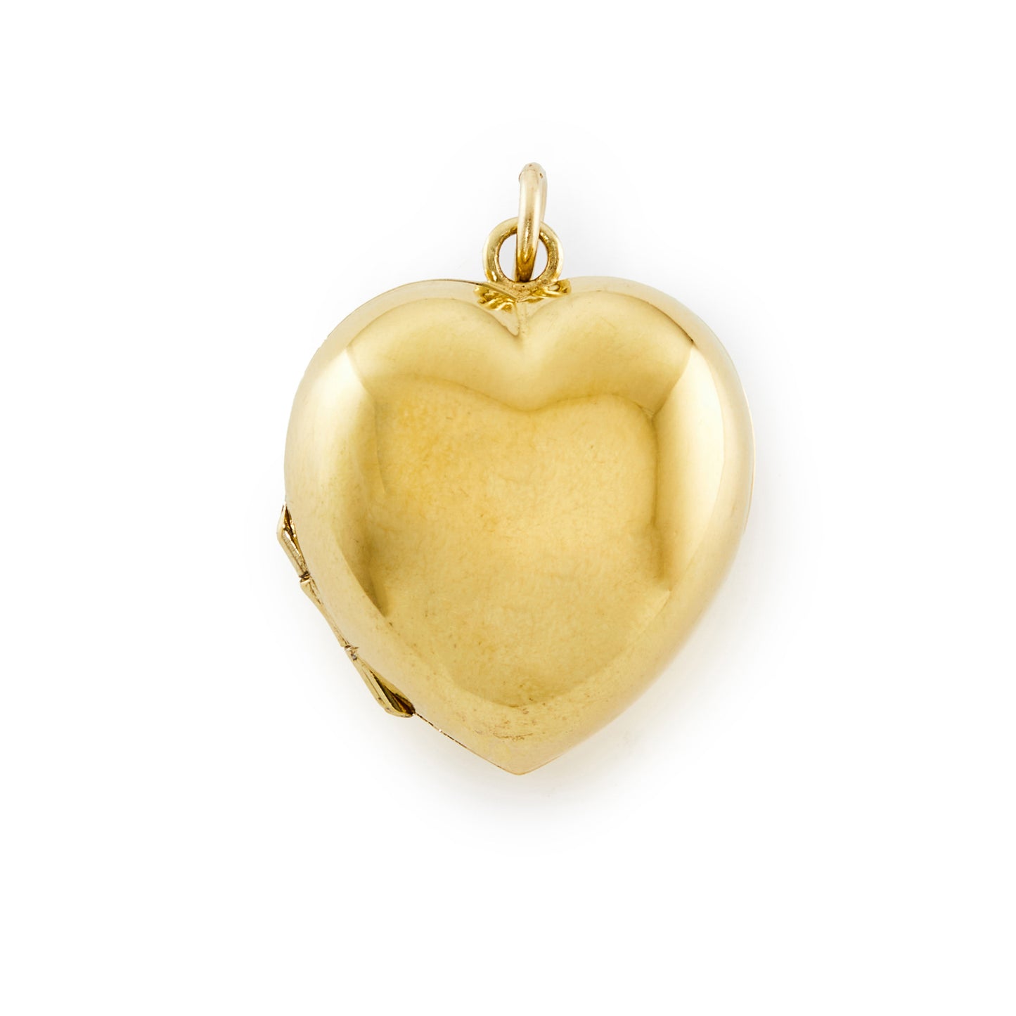 Charming vintage silver gilt puffy heart locket that can take two photographs.