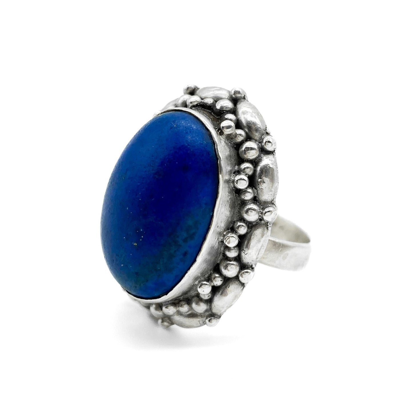 Chunky vintage silver ring set with a lovely bright blue cabochon lapis lazuli stone.