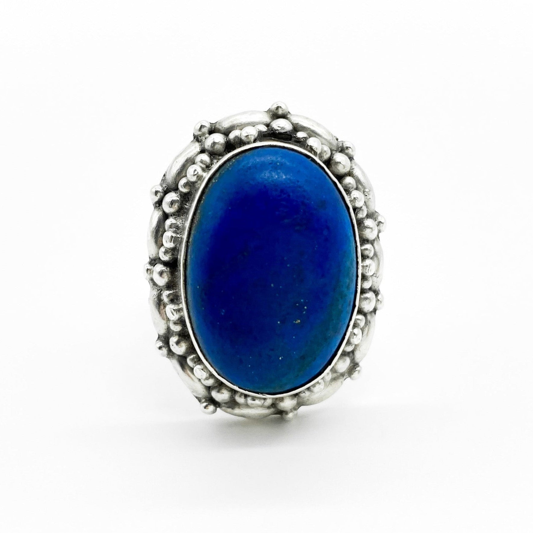 Chunky vintage silver ring set with a lovely bright blue cabochon lapis lazuli stone.