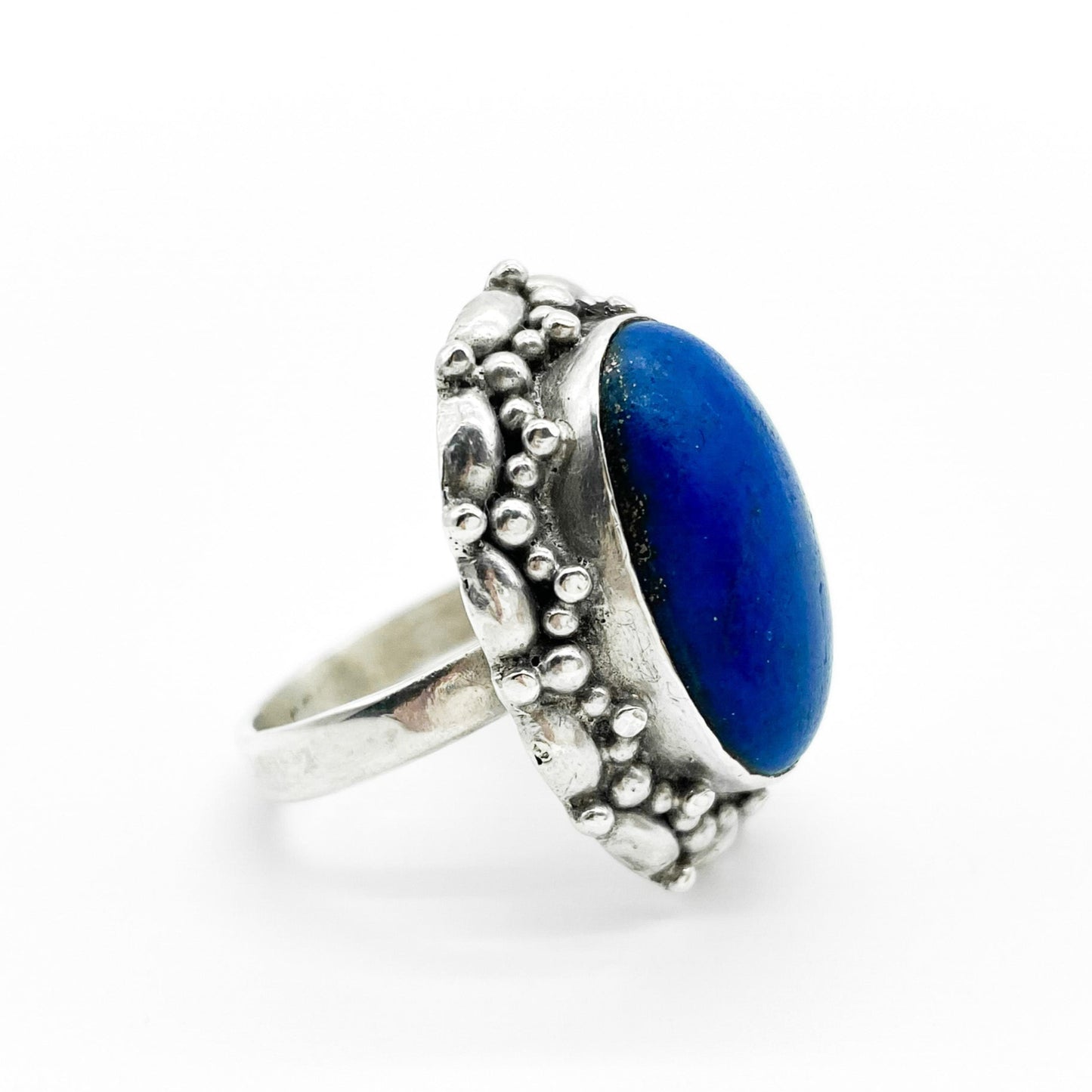 Chunky vintage silver ring set with a lovely bright blue cabochon lapis lazuli stone.