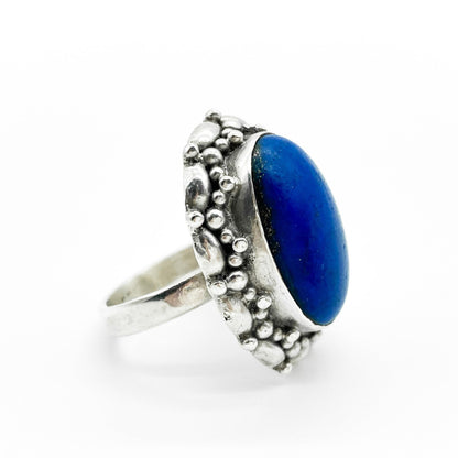 Chunky vintage silver ring set with a lovely bright blue cabochon lapis lazuli stone.