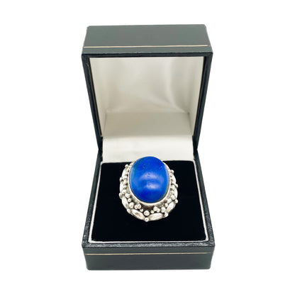 Chunky vintage silver ring set with a lovely bright blue cabochon lapis lazuli stone.