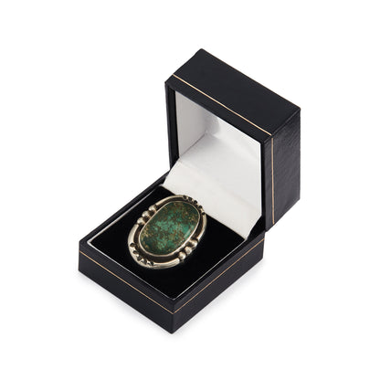 Stunning vintage silver chunky Native American ring set with a beautiful natural green turquoise stone.