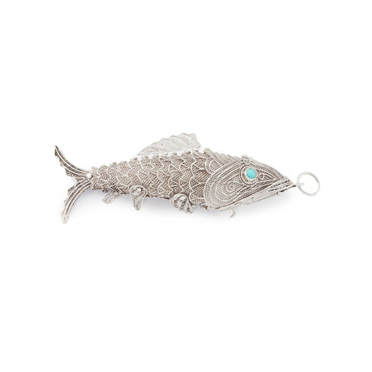 Charming vintage silver filigree spice holder fish pendant with turquoise eyes. The body is articulated with dangling fins.
