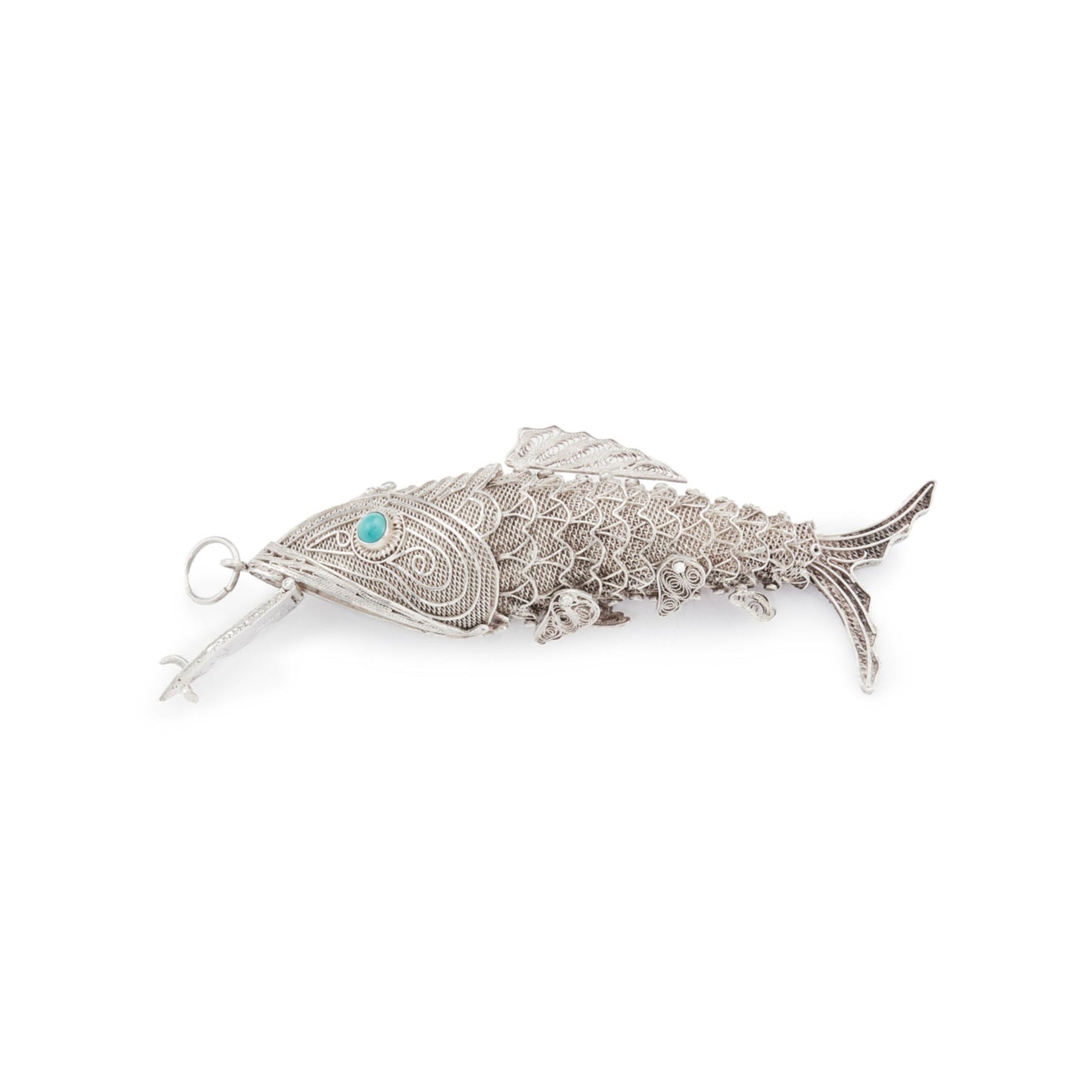 Charming vintage silver filigree spice holder fish pendant with turquoise eyes. The body is articulated with dangling fins.
