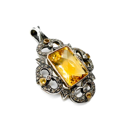 Gorgeous rose gold and silver pendant set with a beautifully faceted rectangular citrine and four smaller round citrines in a pavé diamond setting.