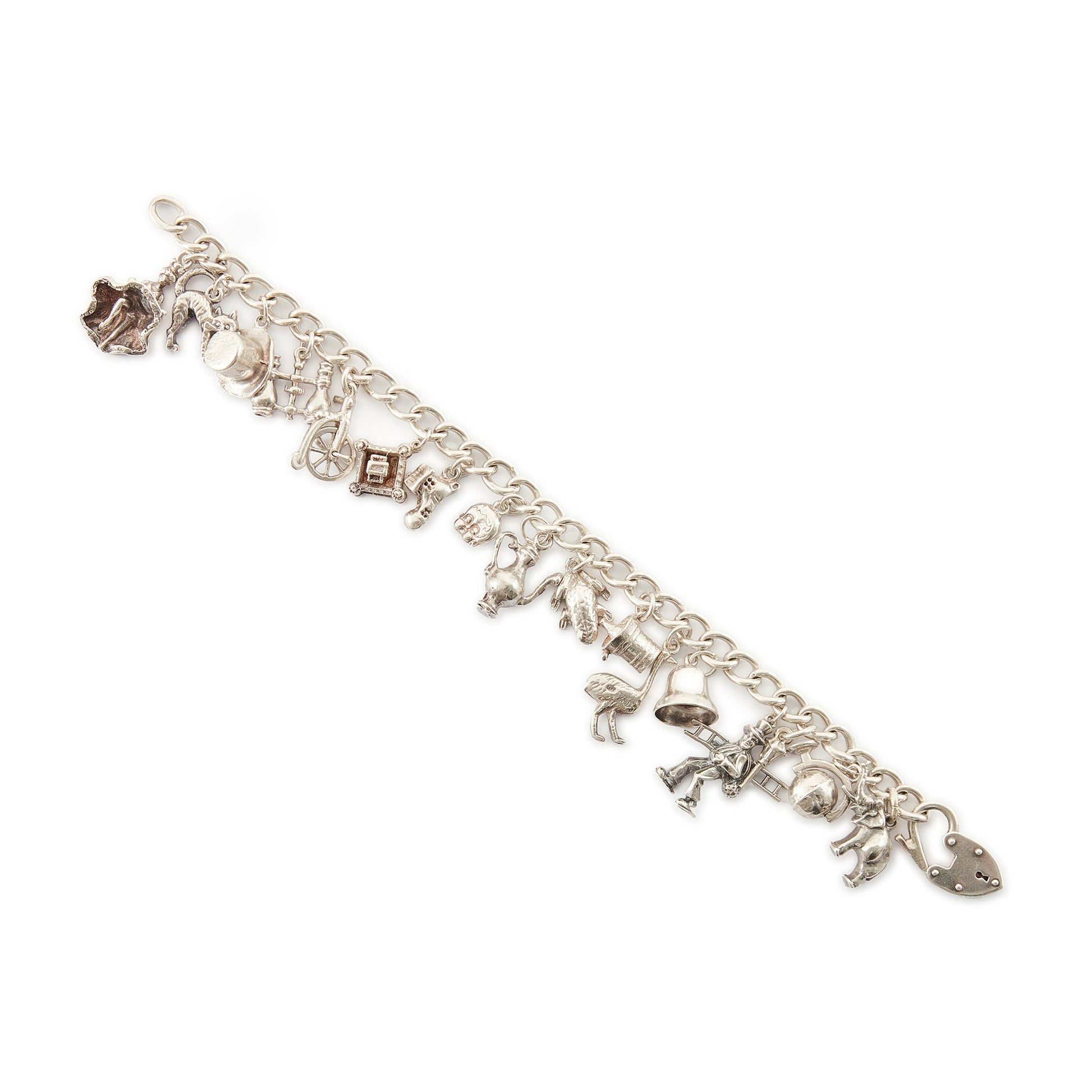 Chunky vintage sterling silver curb link bracelet with seventeen whimsical charms and a heavy padlock. The bracelet has a nice weight to it. 
