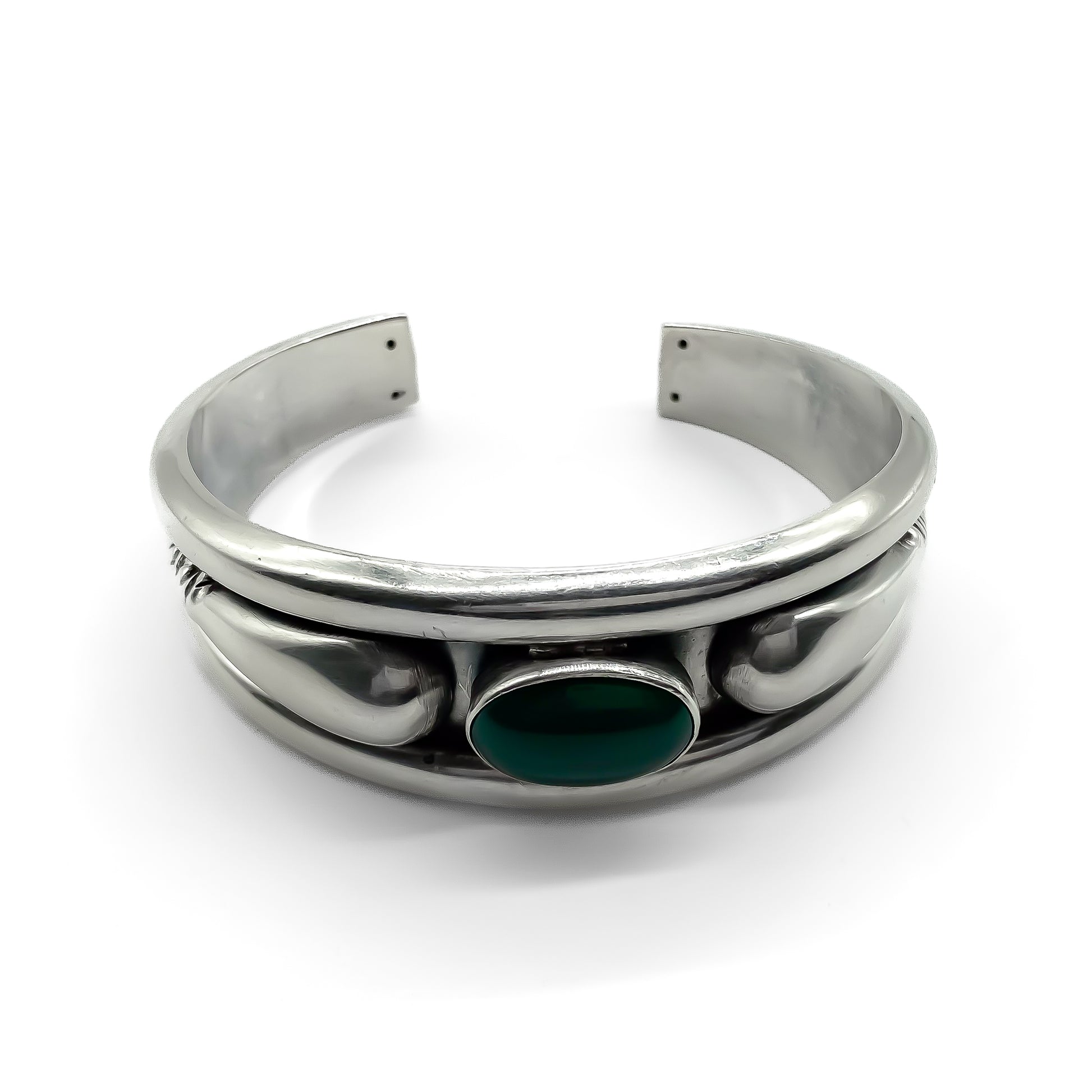 Stylish vintage silver bangle set with an oval chrysoprase cabochon stone.