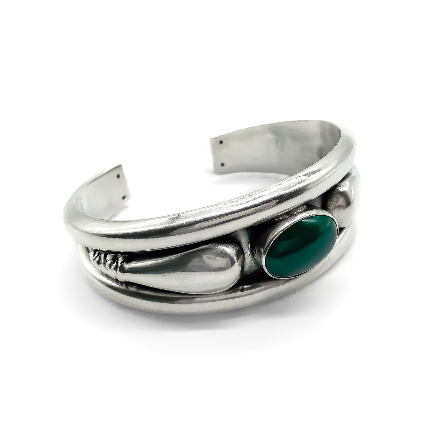 Stylish vintage silver bangle set with an oval chrysoprase cabochon stone.