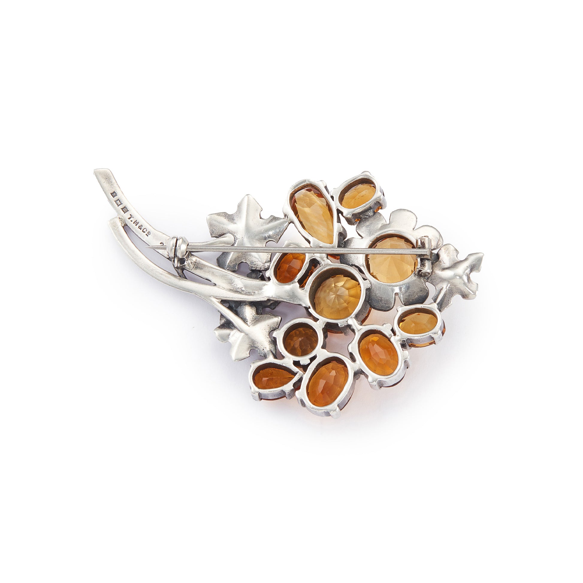 Stunning sterling silver designer brooch set with ten beautifully faceted citrines in a range of yellow and amber hues. Made by Thomas Millward & Co (Birmingham)
