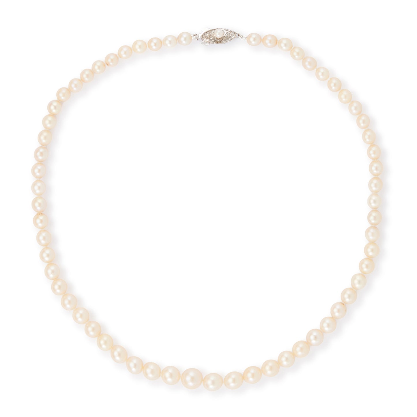 Classic vintage string of graduated seawater pearls with a sterling silver and pearl clasp. The pearls have a creamy hue and a good lustre.