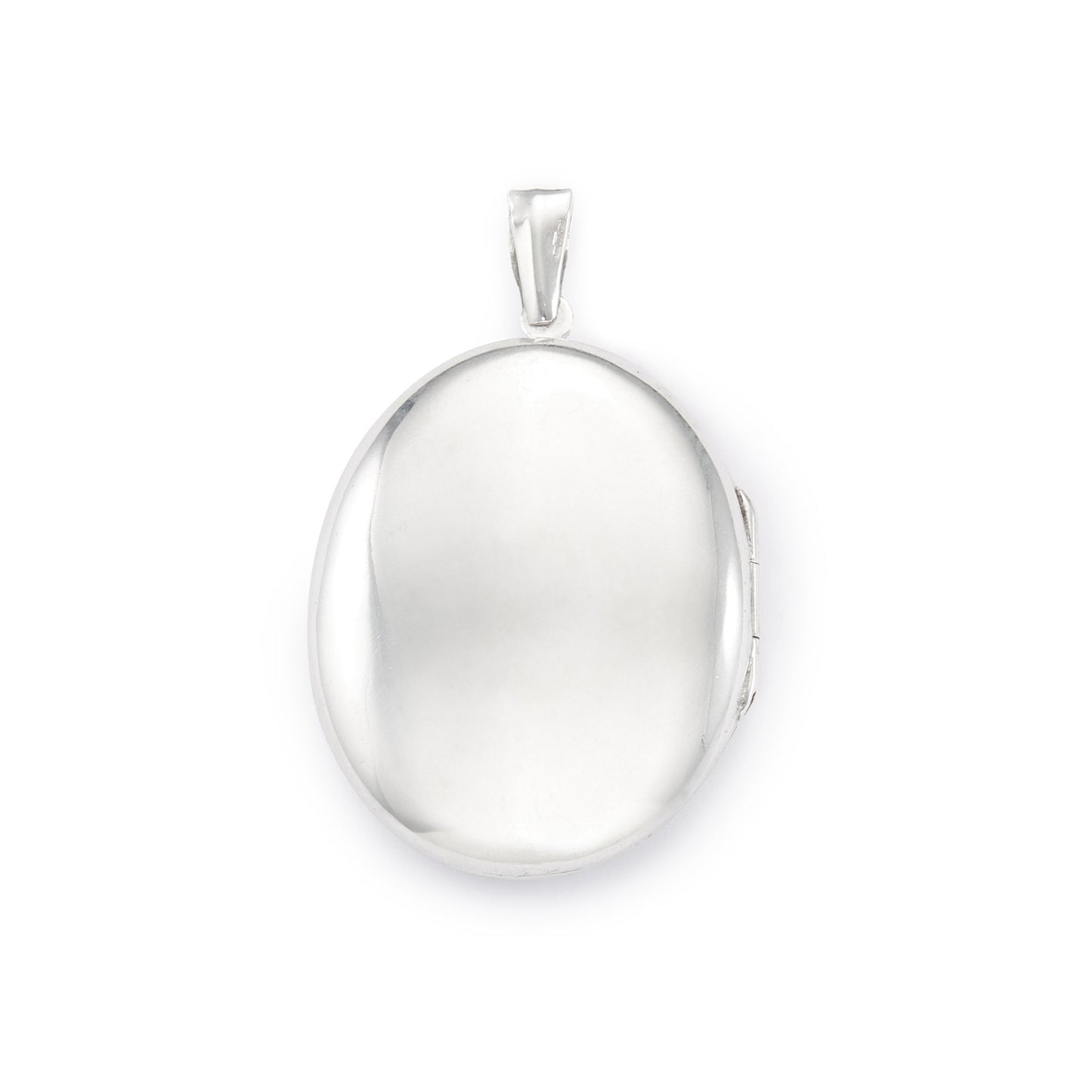 Lovely vintage sterling silver locket with ornate engraving detail on the front.
