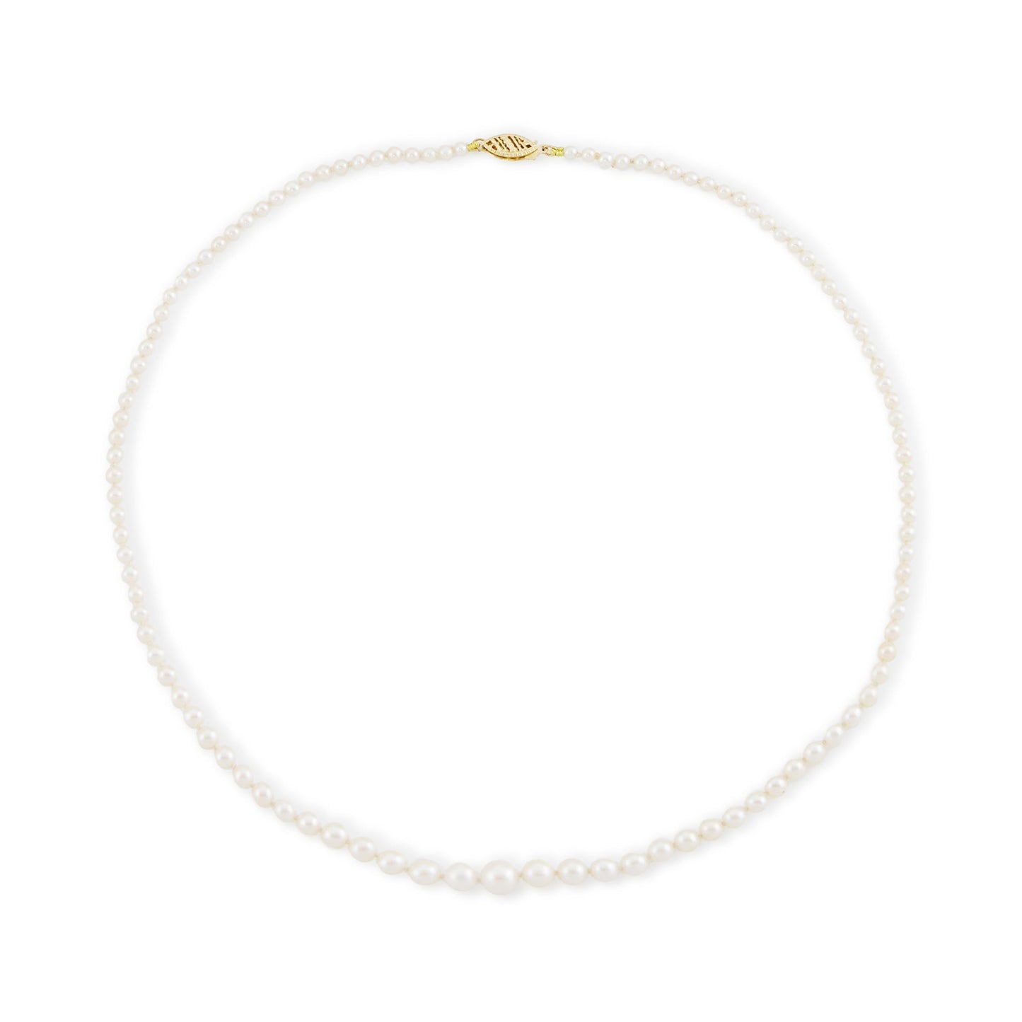 Lustrous graduated string of vintage cultured seawater pearls with a 14ct gold filigree clasp.