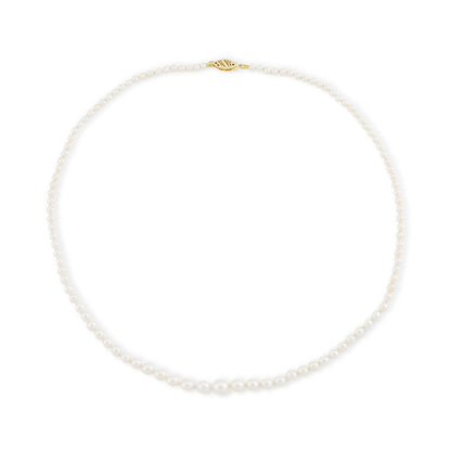 Lustrous graduated string of vintage cultured seawater pearls with a 14ct gold filigree clasp.