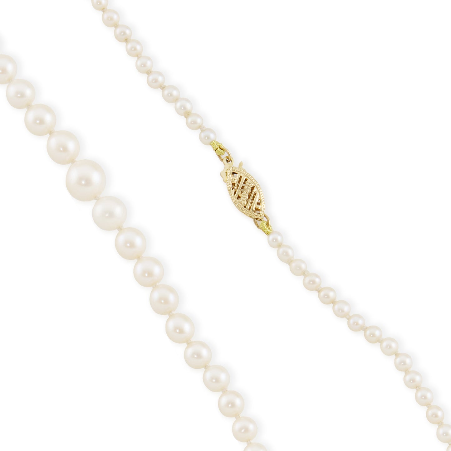 Lustrous graduated string of vintage cultured seawater pearls with a 14ct gold filigree clasp.
