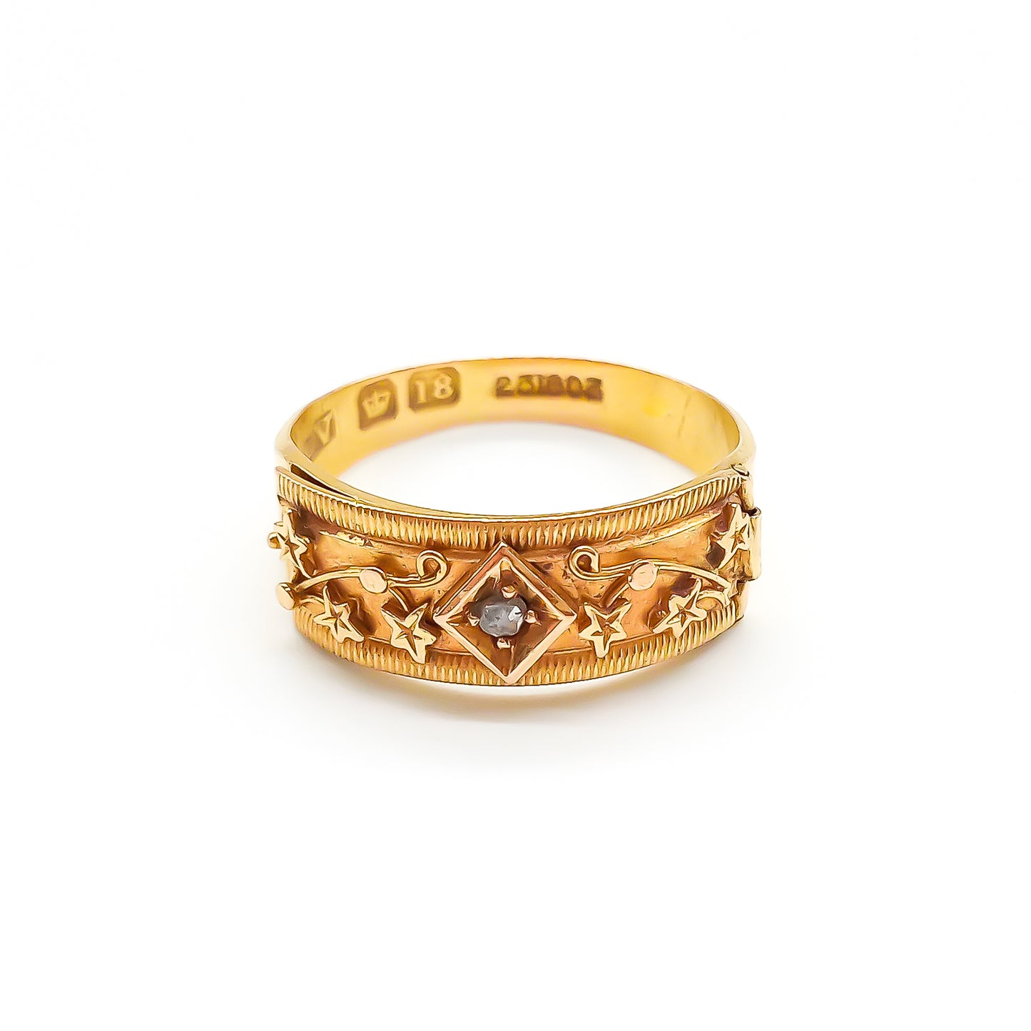 Rare 18ct gold Victorian REGARD ring set with a small mine-cut diamond and delicate leaf design.