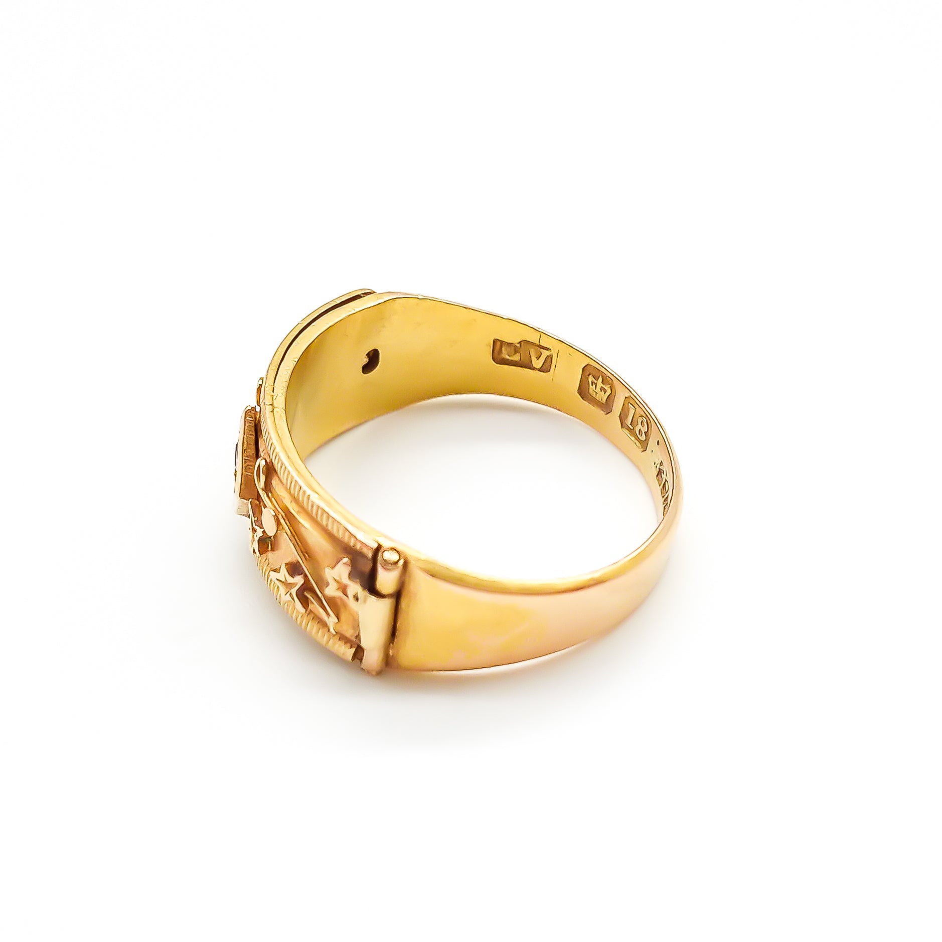 Rare 18ct gold Victorian REGARD ring set with a small mine-cut diamond and delicate leaf design.