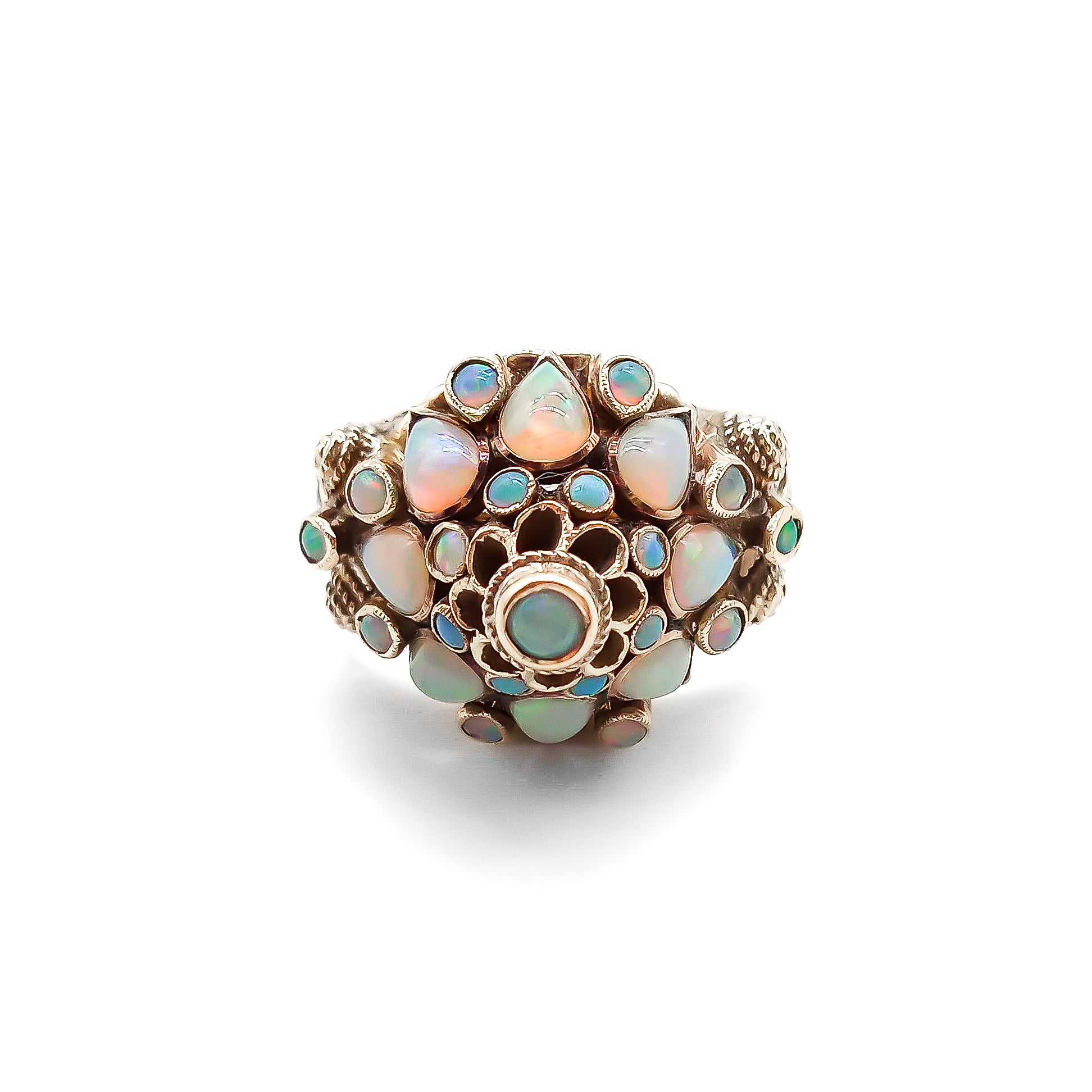 Spectacular 18ct rose gold cocktail ring with lustrous opals in a multi-tier setting.