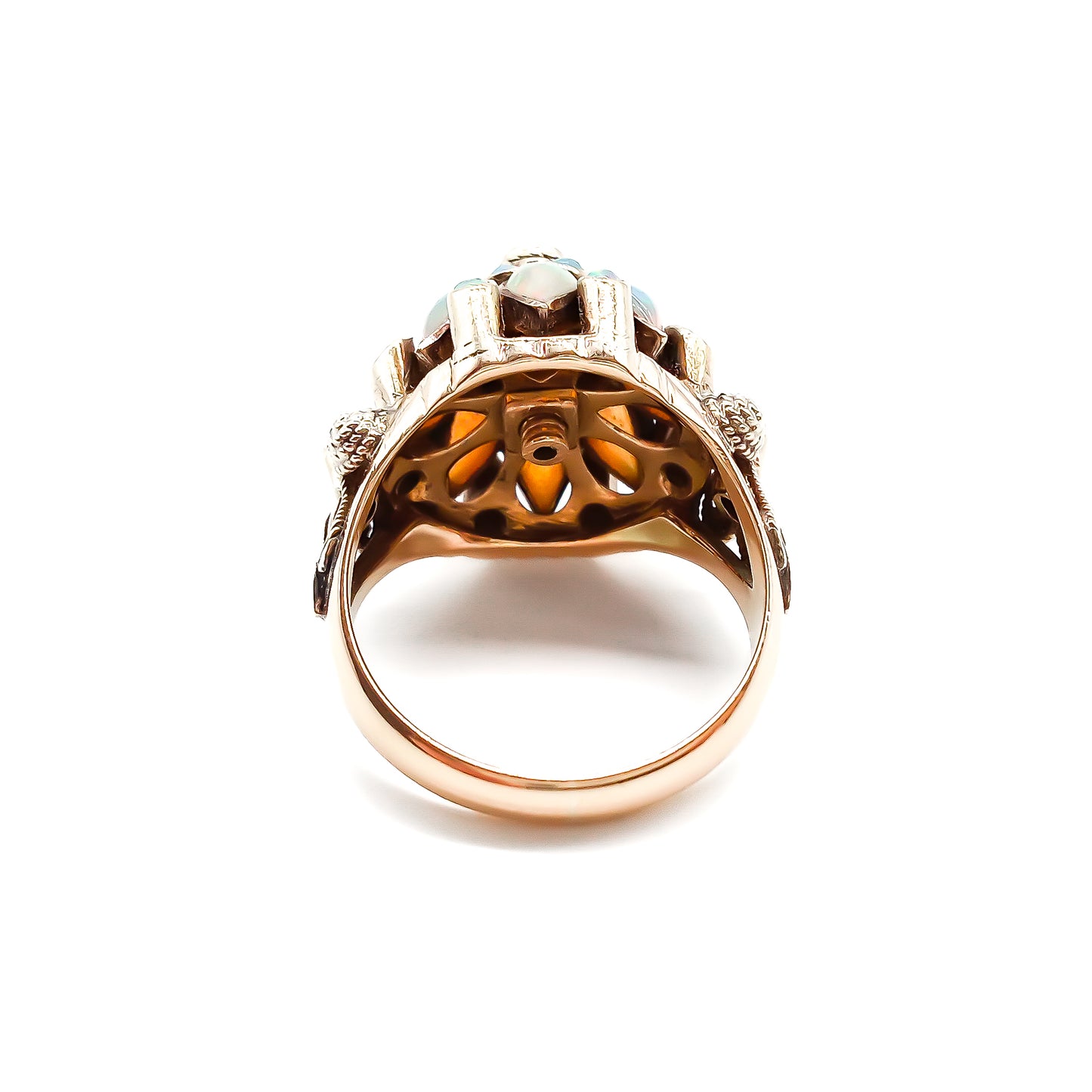 Spectacular 18ct rose gold cocktail ring with lustrous opals in a multi-tier setting.