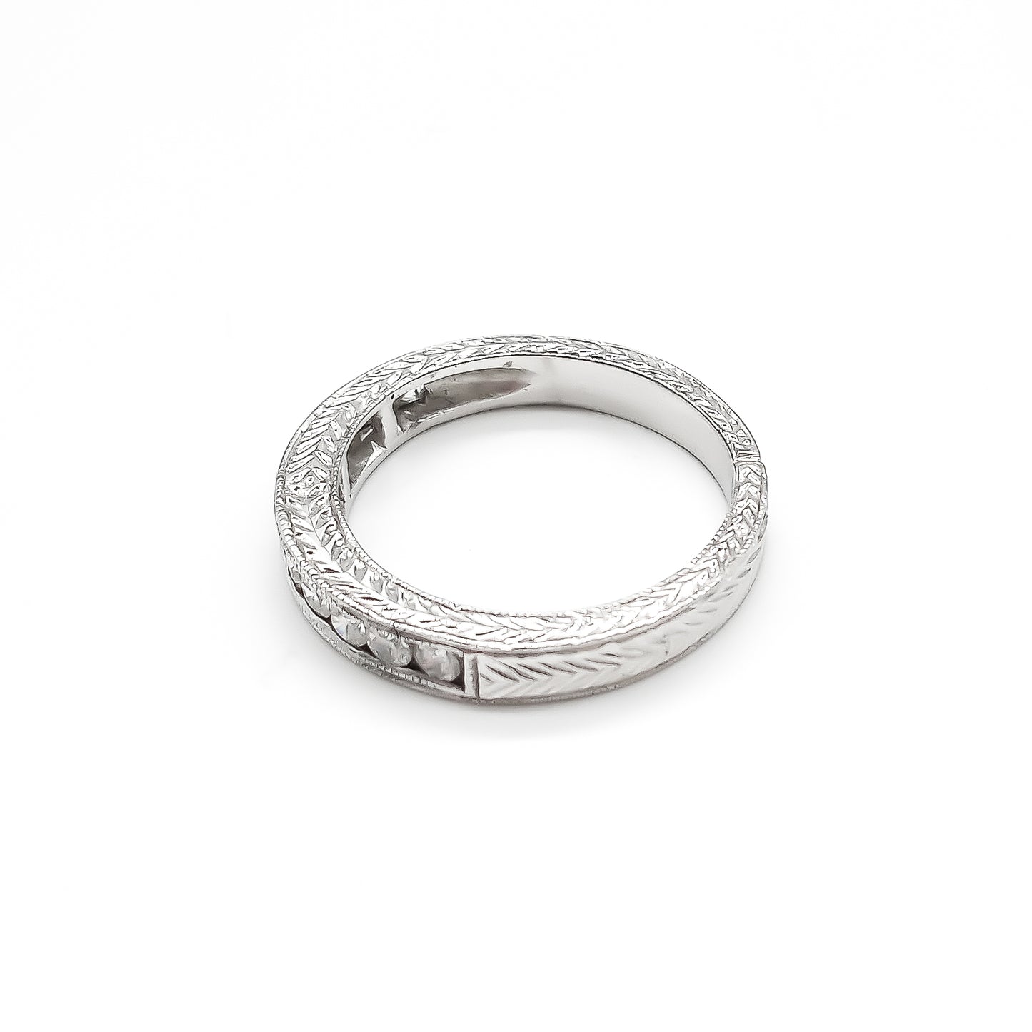 Classic 18ct white gold half eternity ring with eleven sparkling diamonds in a tube setting.