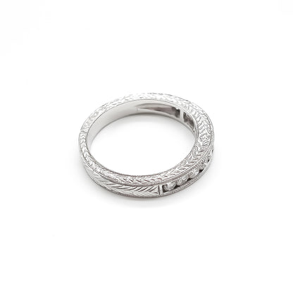 Classic 18ct white gold half eternity ring with eleven sparkling diamonds in a tube setting.