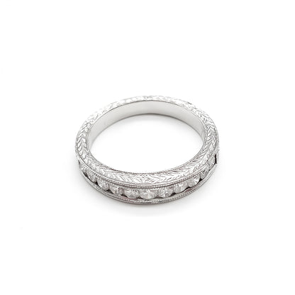 Classic 18ct white gold half eternity ring with eleven sparkling diamonds in a tube setting.