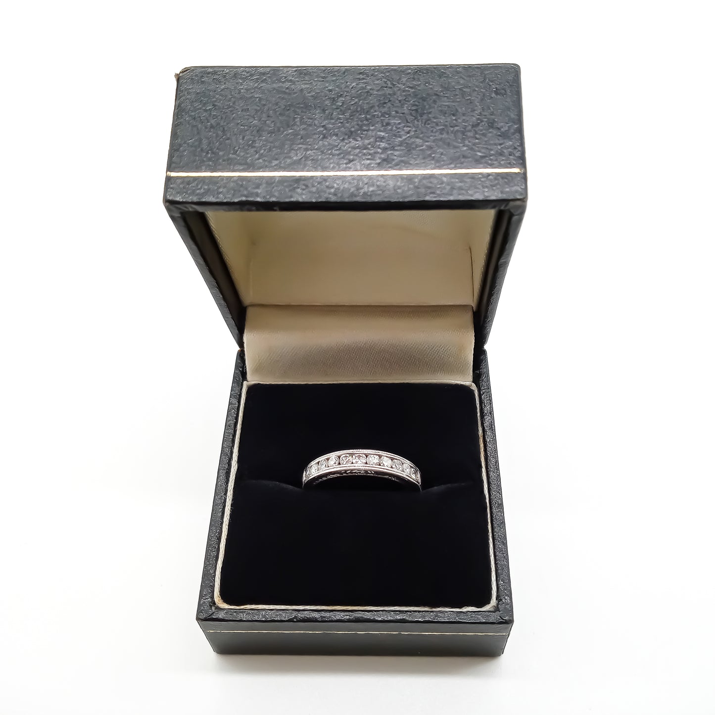 Classic 18ct white gold half eternity ring with eleven sparkling diamonds in a tube setting.