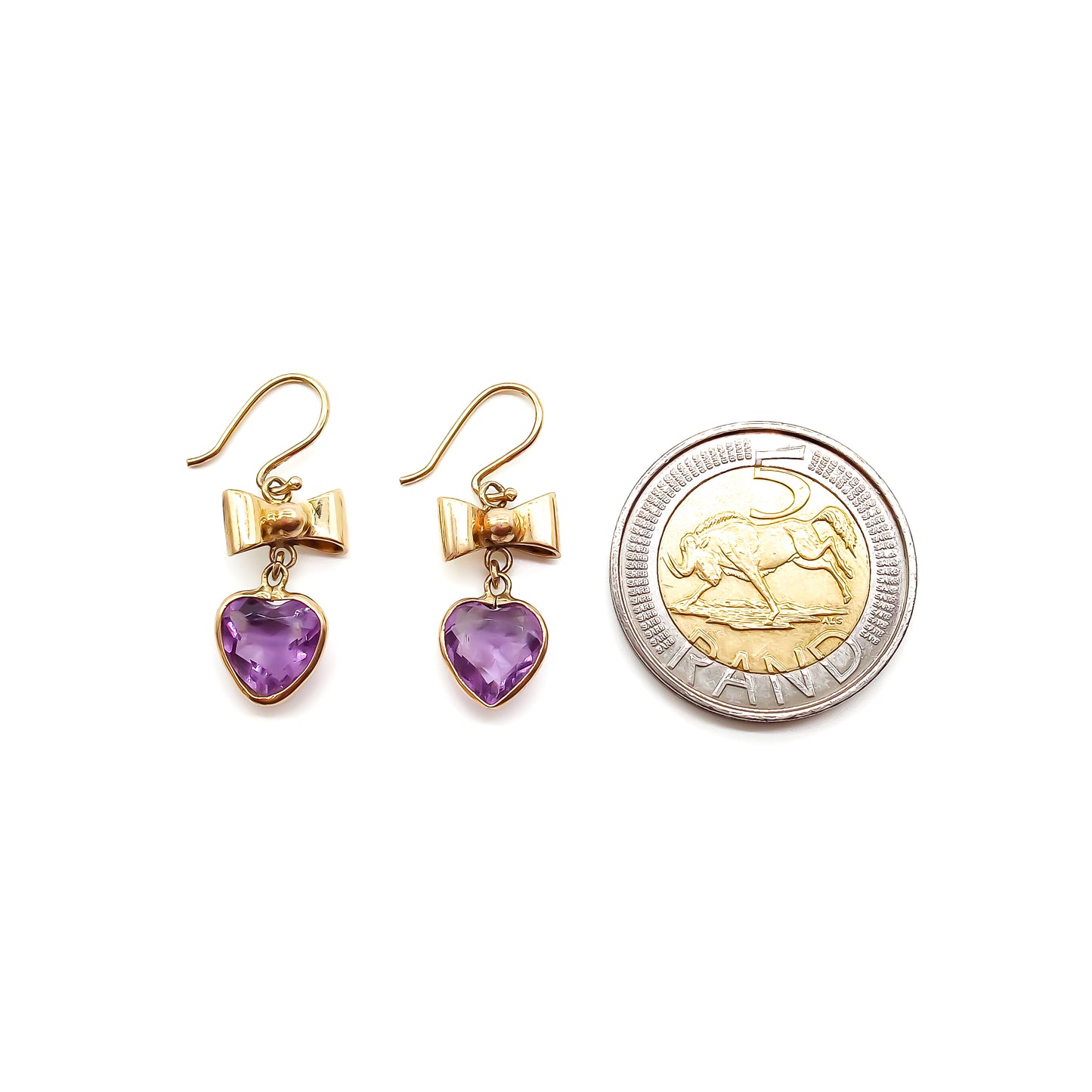 Lovely 9ct yellow gold bow earrings with dangling heart-shaped amethyst drops.