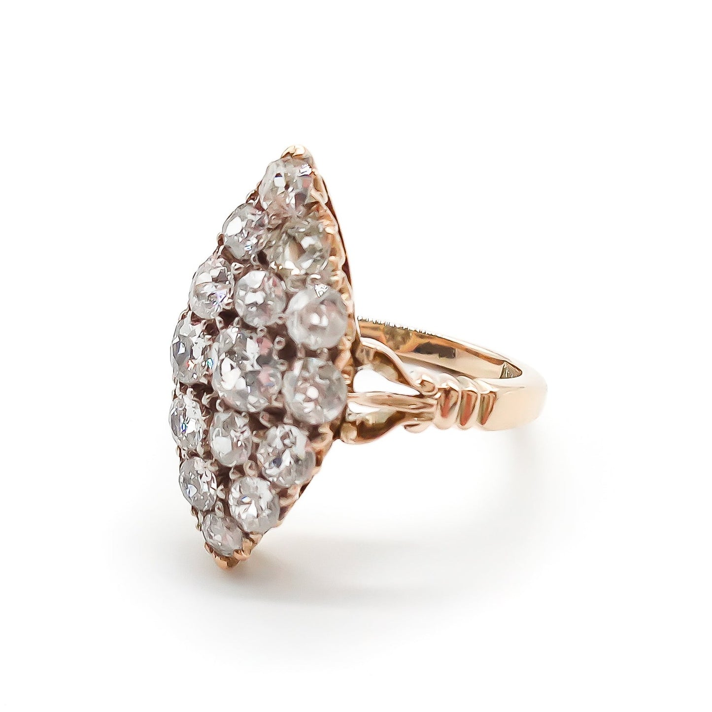 Gorgeous Victorian 18ct rose gold ring set with fifteen sparkling Old-European cut diamonds in a marquise shape.