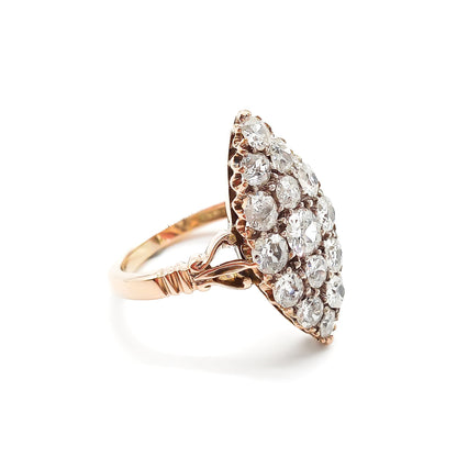 Gorgeous Victorian 18ct rose gold ring set with fifteen sparkling Old-European cut diamonds in a marquise shape.