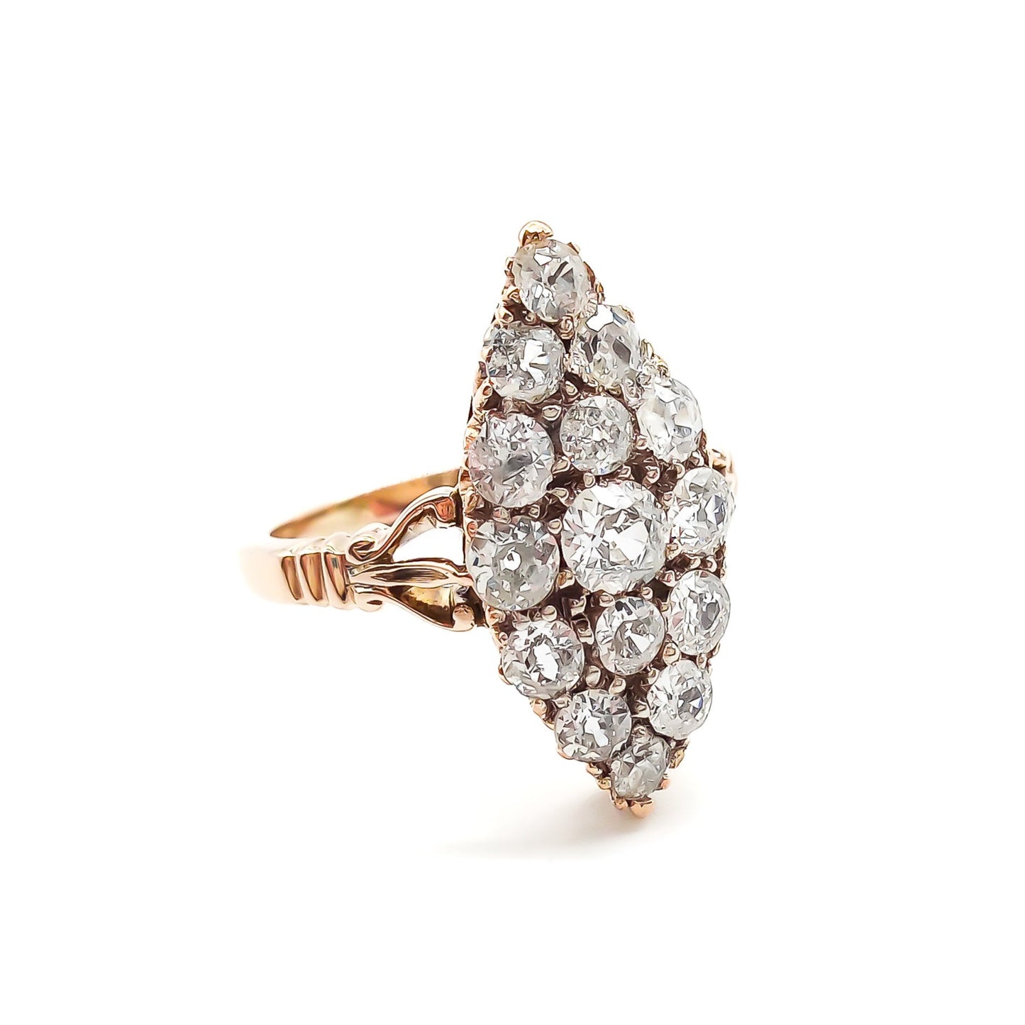 Gorgeous Victorian 18ct rose gold ring set with fifteen sparkling Old-European cut diamonds in a marquise shape.