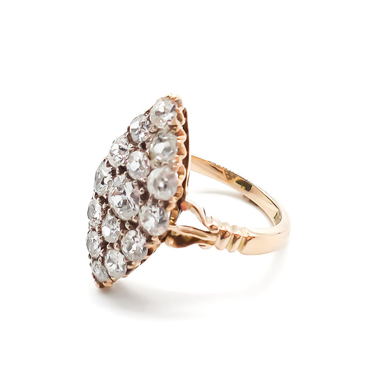 Gorgeous Victorian 18ct rose gold ring set with fifteen sparkling Old-European cut diamonds in a marquise shape.