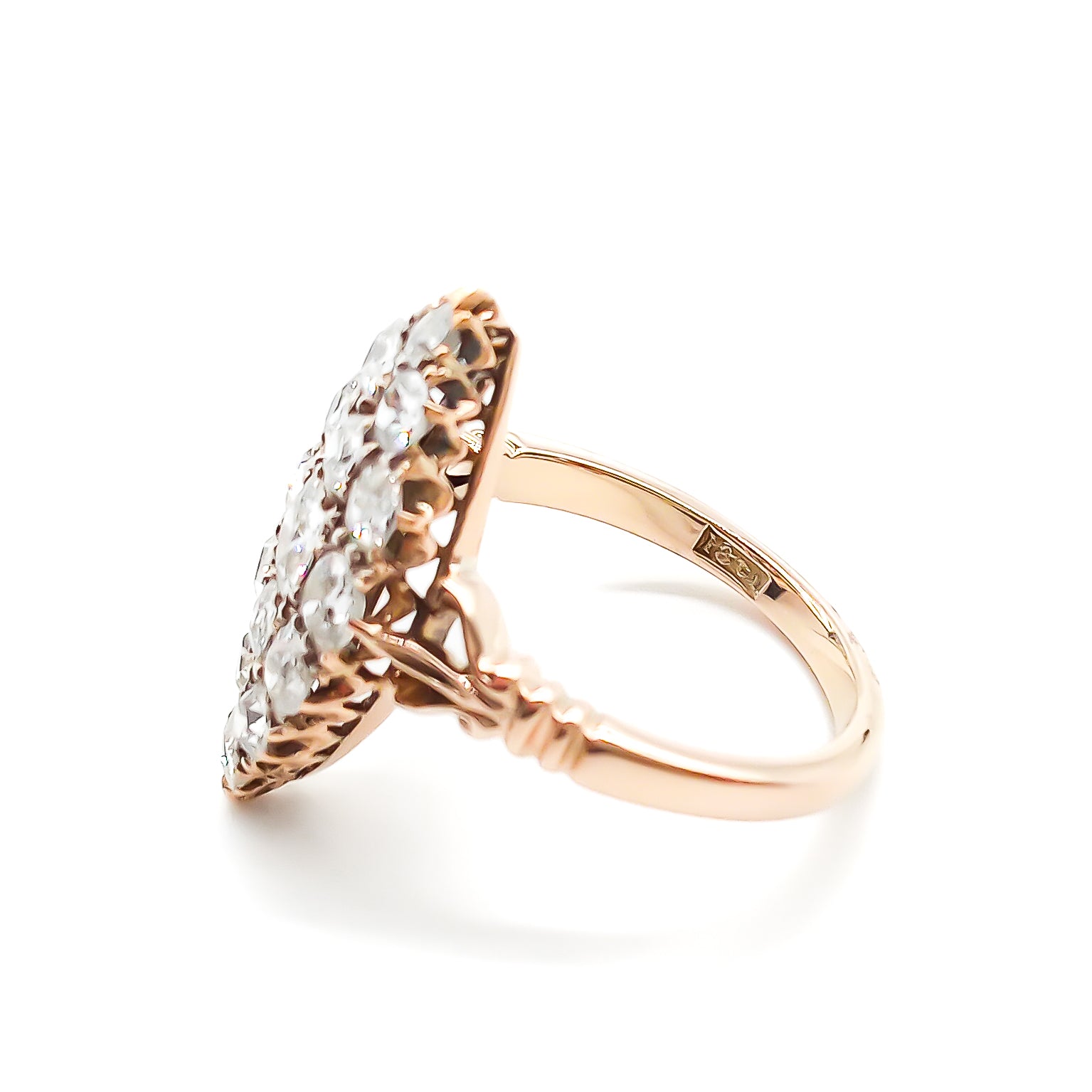 Gorgeous Victorian 18ct rose gold ring set with fifteen sparkling Old-European cut diamonds in a marquise shape.