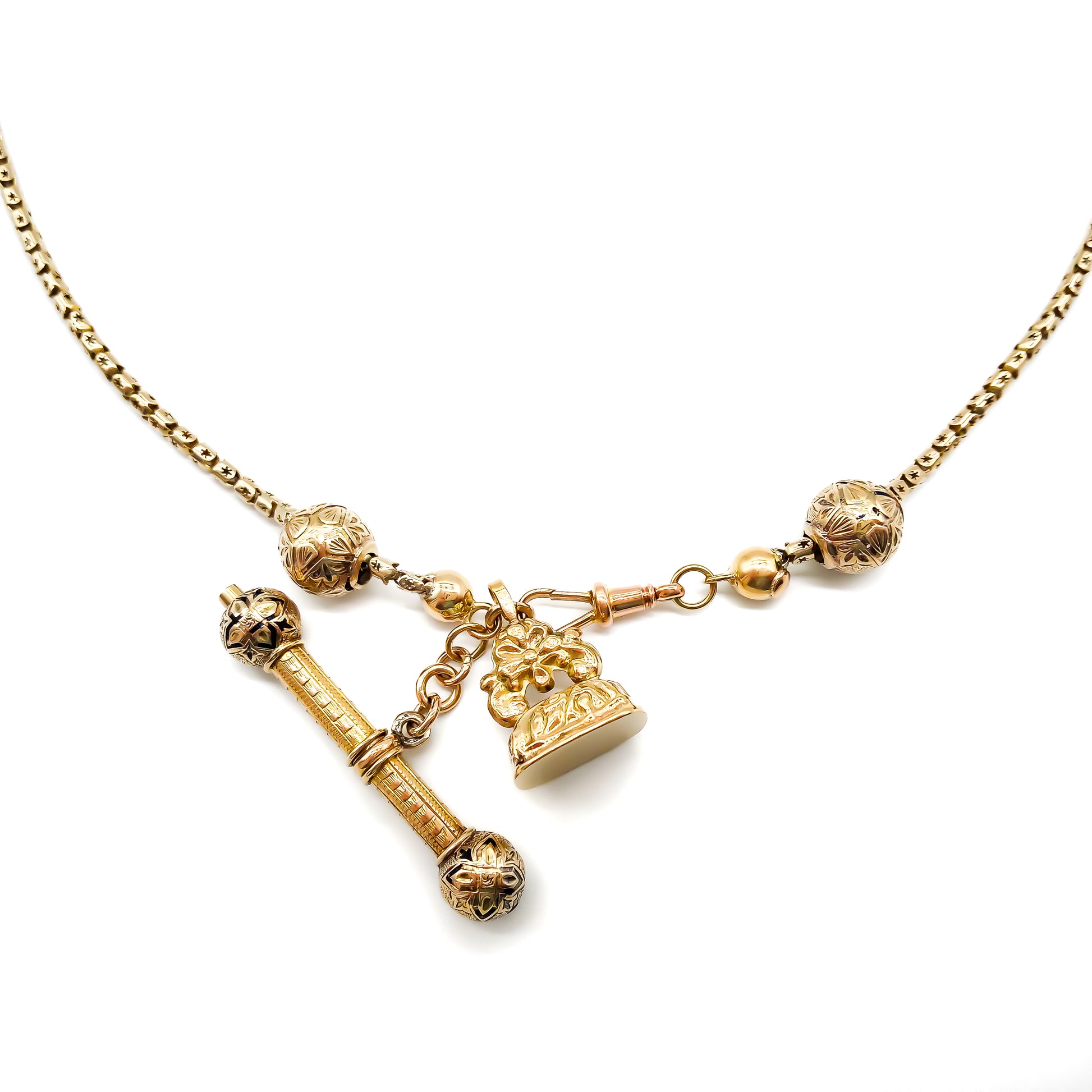 Lovely 9ct gold Victorian rope link chain with an ornate seal, t-bar, round sliders and a dog-clip. 